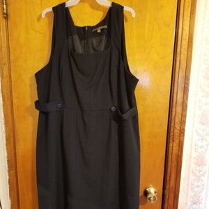 Sleeveless black sheath dress